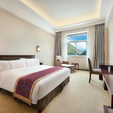 Ramada Encore Daocheng Yading Экстерьер фото