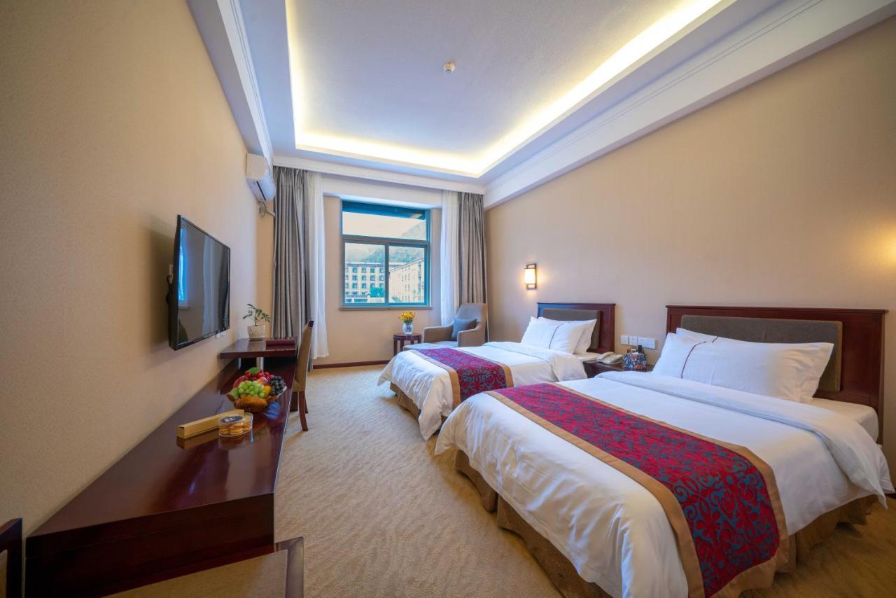 Ramada Encore Daocheng Yading Экстерьер фото