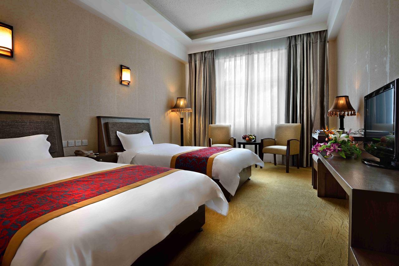Ramada Encore Daocheng Yading Экстерьер фото