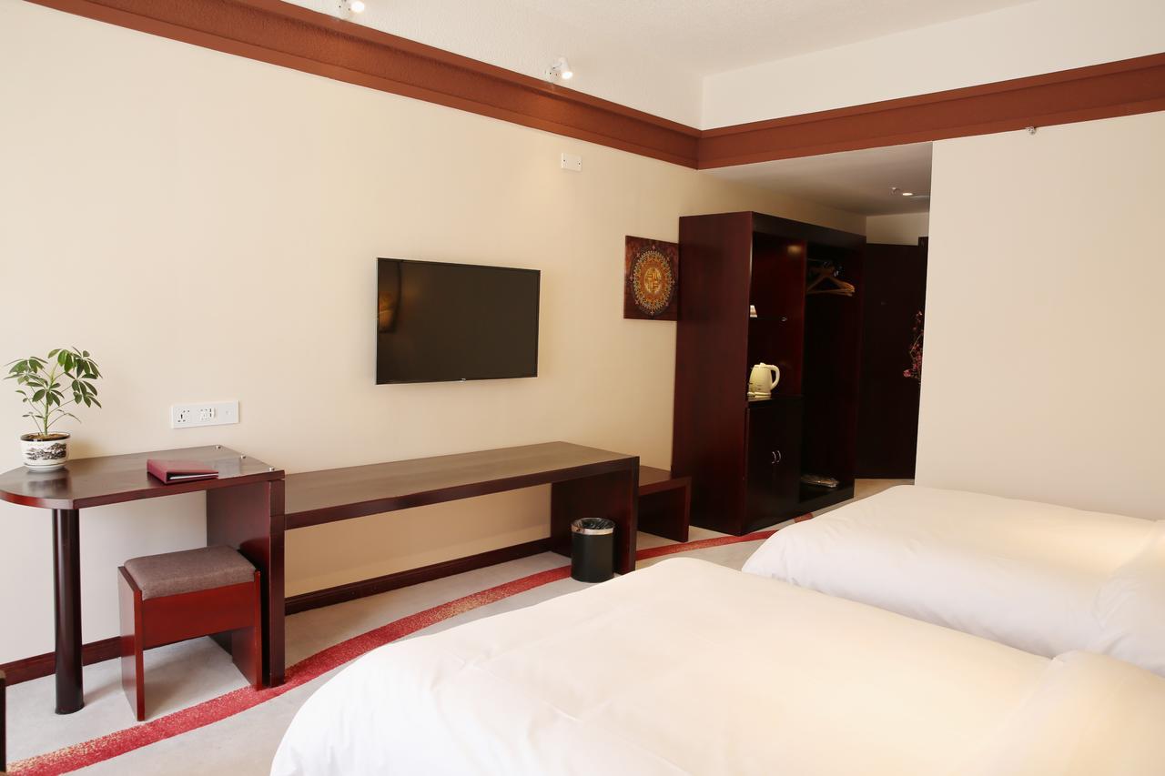 Ramada Encore Daocheng Yading Экстерьер фото