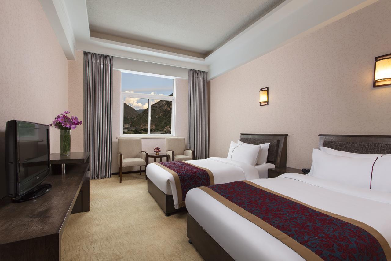 Ramada Encore Daocheng Yading Экстерьер фото